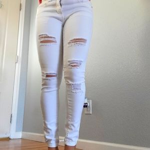 Women's Ripped Mid Rise Skinny Jeans